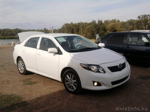 продам автомобиль Toyota corolla 2009г.в.цена-24000$,  цвет белый, все опции...... #132783