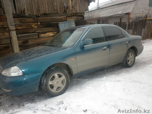 Kia       Кредос #201699