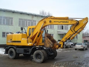 ХЮНДАЙ-1400W,  75000$ 2003г.в.,  колесный экскаватор ,  ковш 0, 71 м.куб.,  отвал  #242764