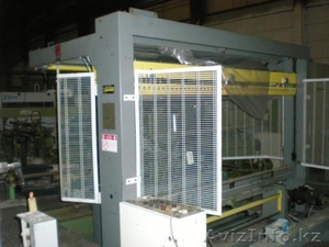 Линия для упаковки изделий в термоусаживаемую плёнку - Комил (Италия),  бывшая в  #288906