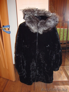 Продам женскую мутоновую  шубу черного цвета #551302