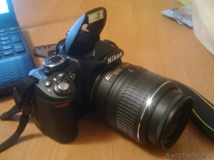 Фотограф с фотоопаратом Nikon #527052