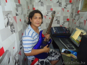 Уроки игры на гитаре Studio Rainbau #701845