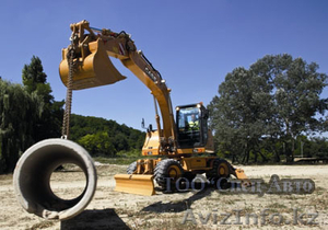 Колесный экскаватор CASE  #869859