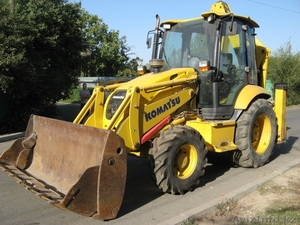 Экскаватор-погрузчик KOMATSU  #1009435