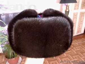 Продаю шапку норковую. Тёмно-коричневая,  не стриженая норка,  новая не  #1004982