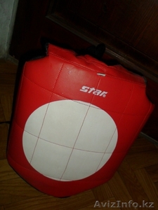 Продам НОВЫЙ протектор taekwondo WTF #1133089