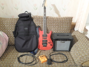 Продам комплект электрогитара,  чехол,  усилитель,  педаль и мелочевку #1384613