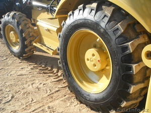 Шины на экскаватор погрузчик  Caterpillar Cat (Кат)  #1542357